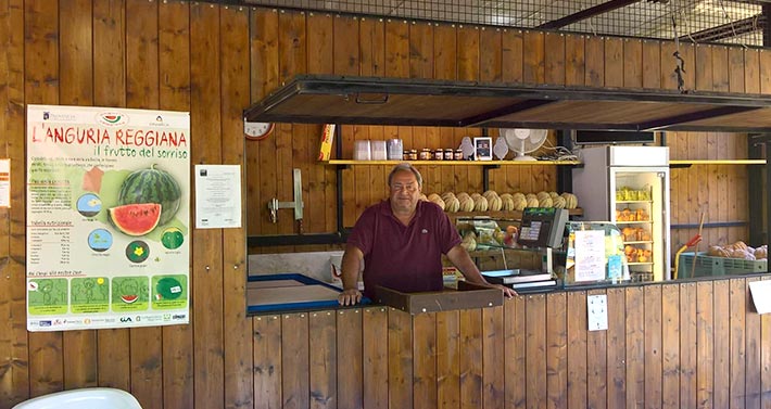 Watermelon kiosk with Mr. Zarantonello at the counter